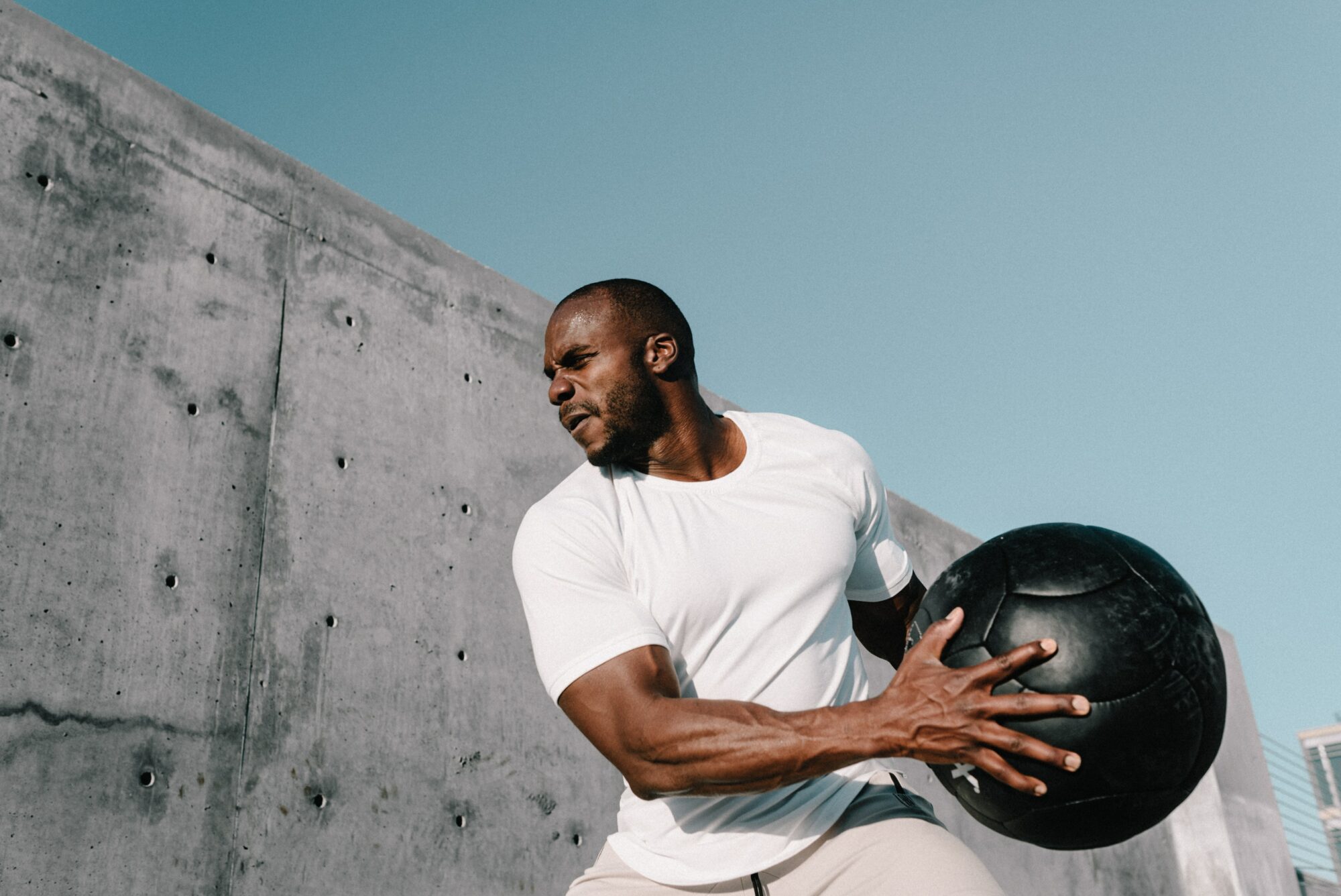 man working out with ball