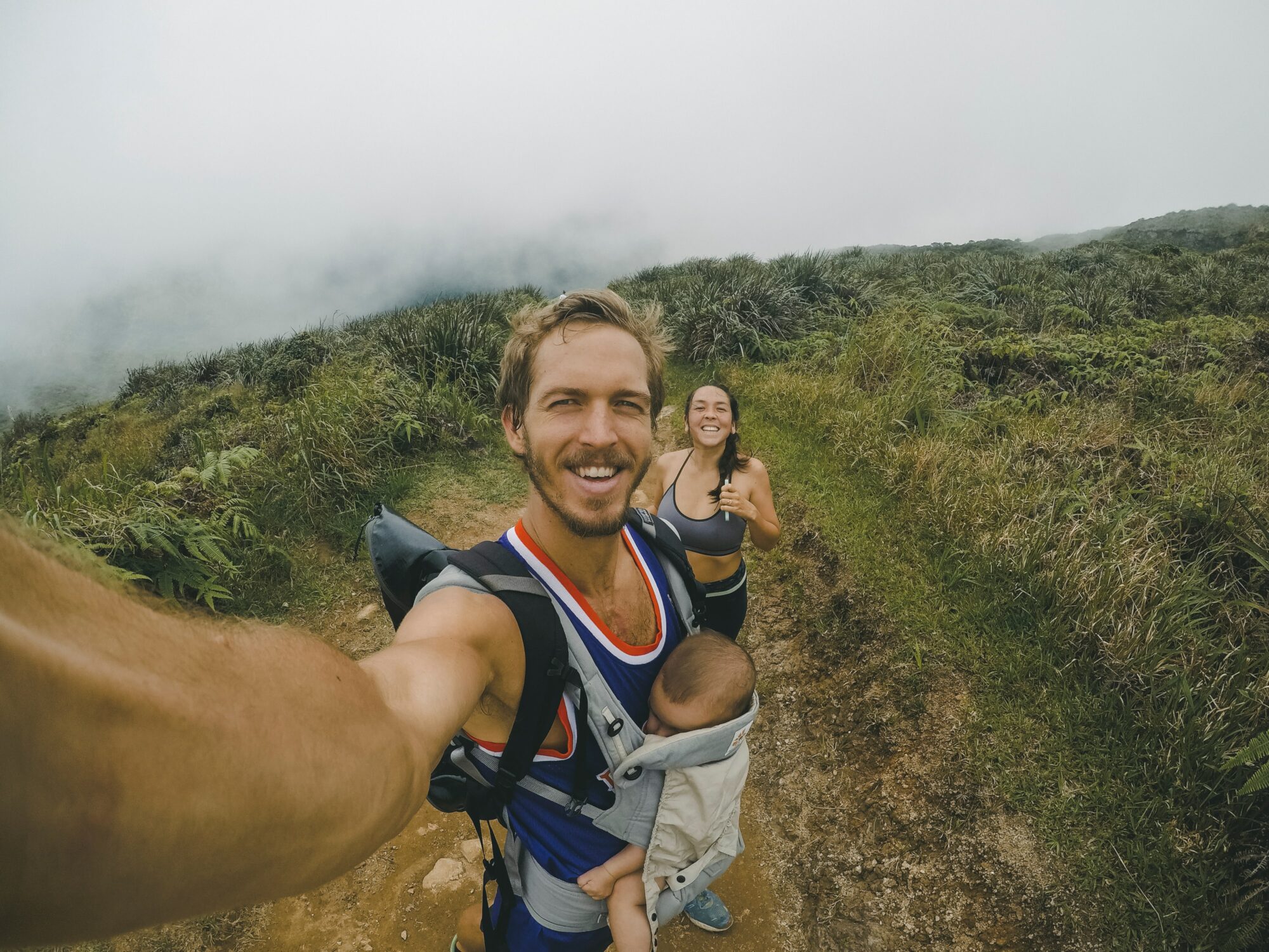 couple taking selfie in mountains