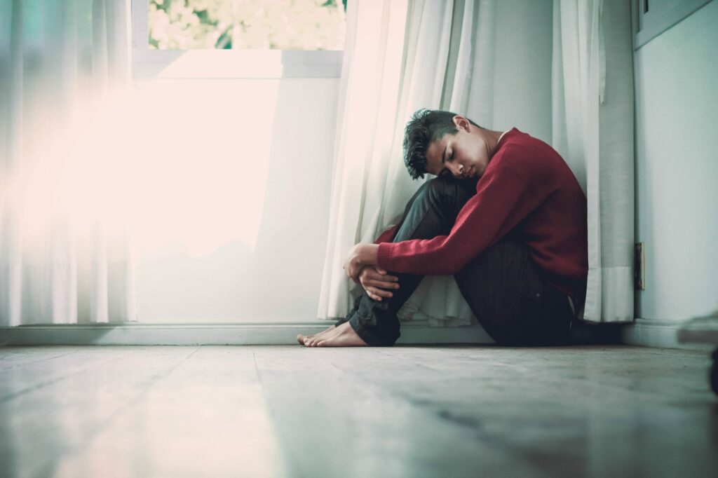 man sleeping on floor