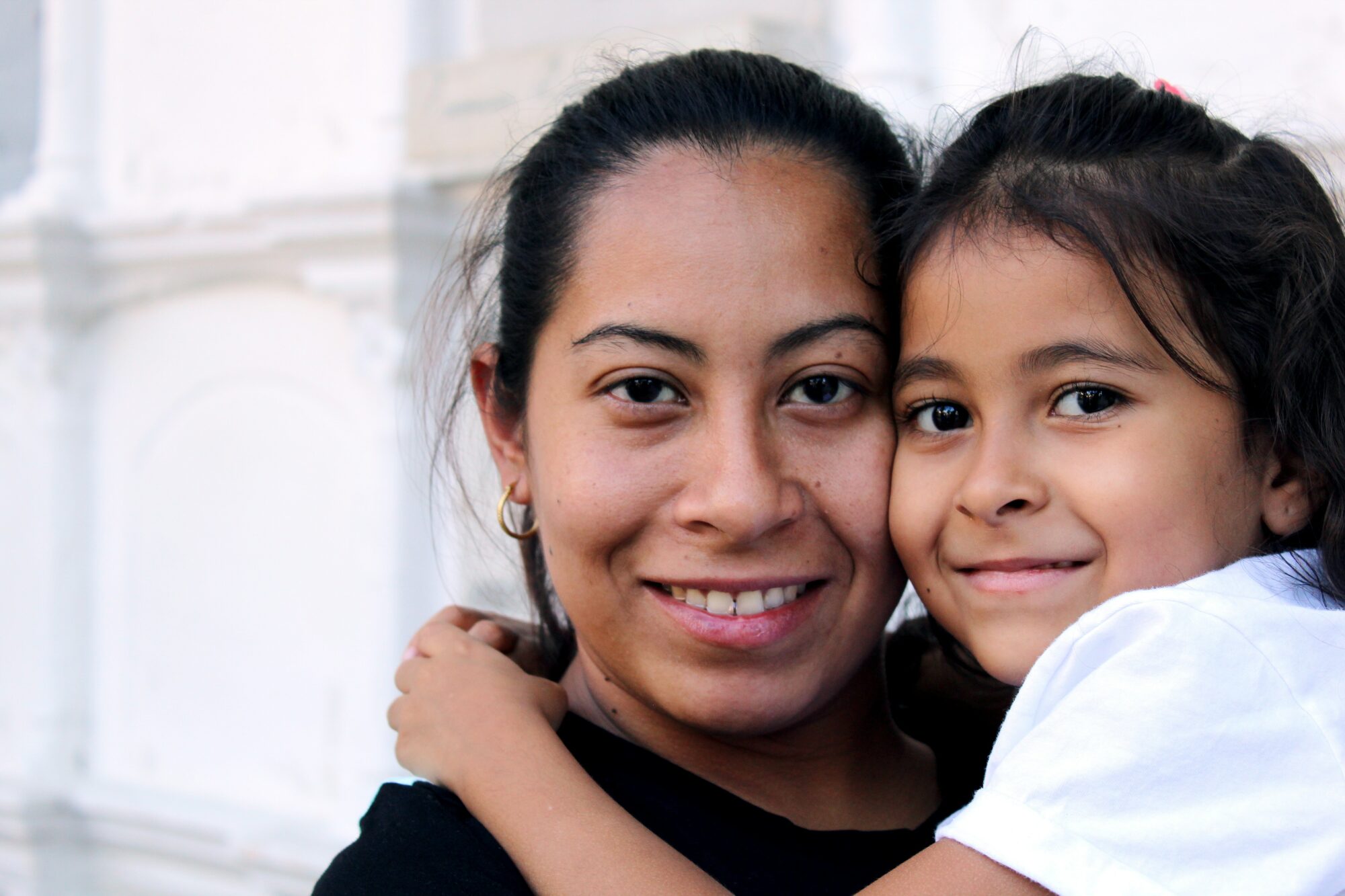 mother and child smiling