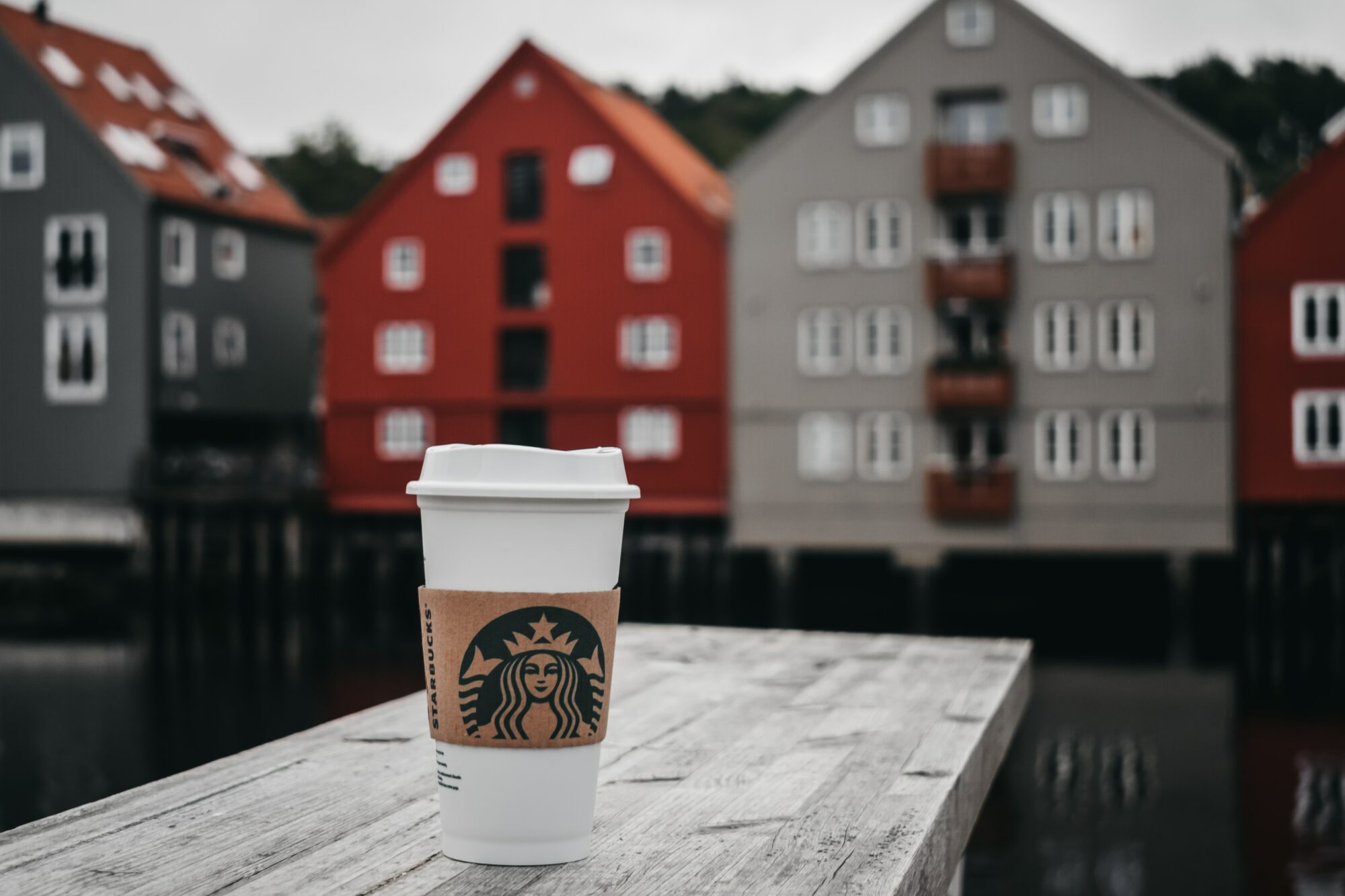 Starbucks with houses behind it