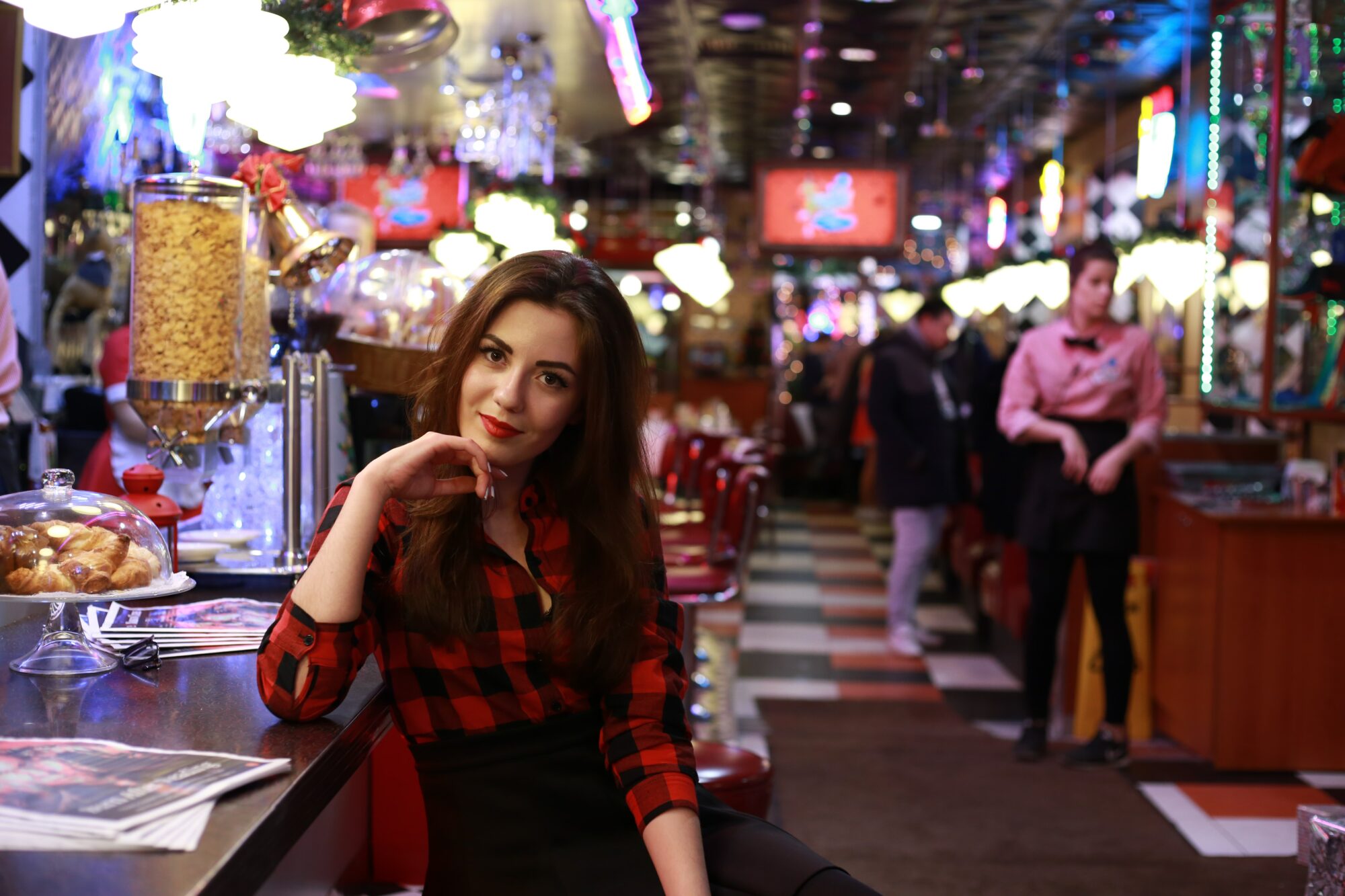 woman leaning against counter