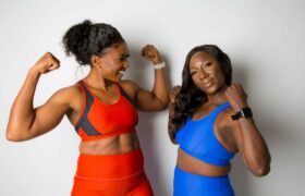 women flexing muscles