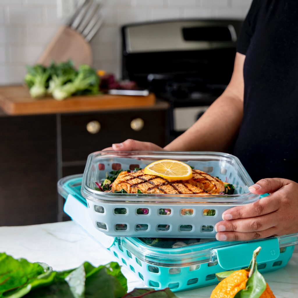 putting food into containers