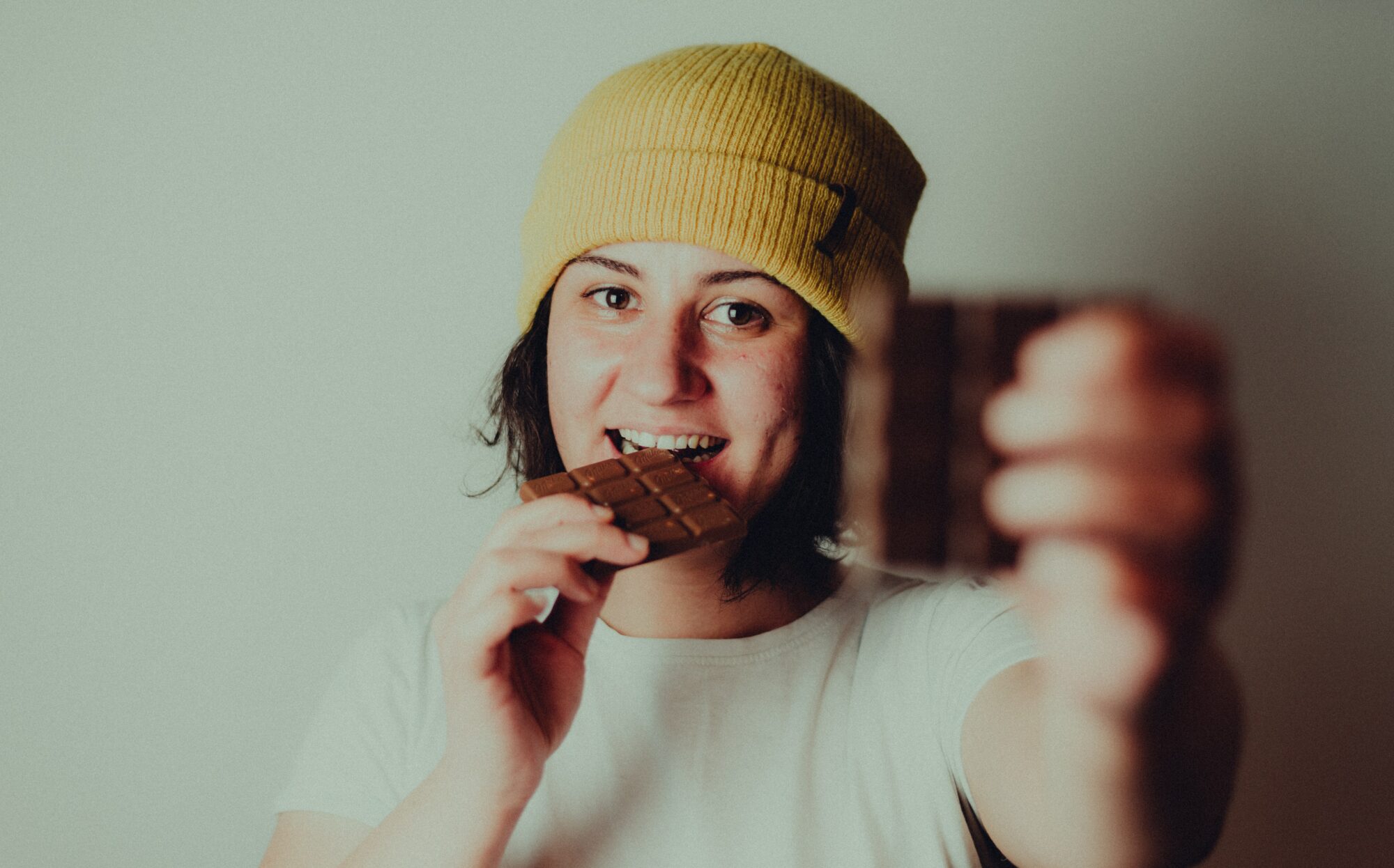 woman eating chocolate