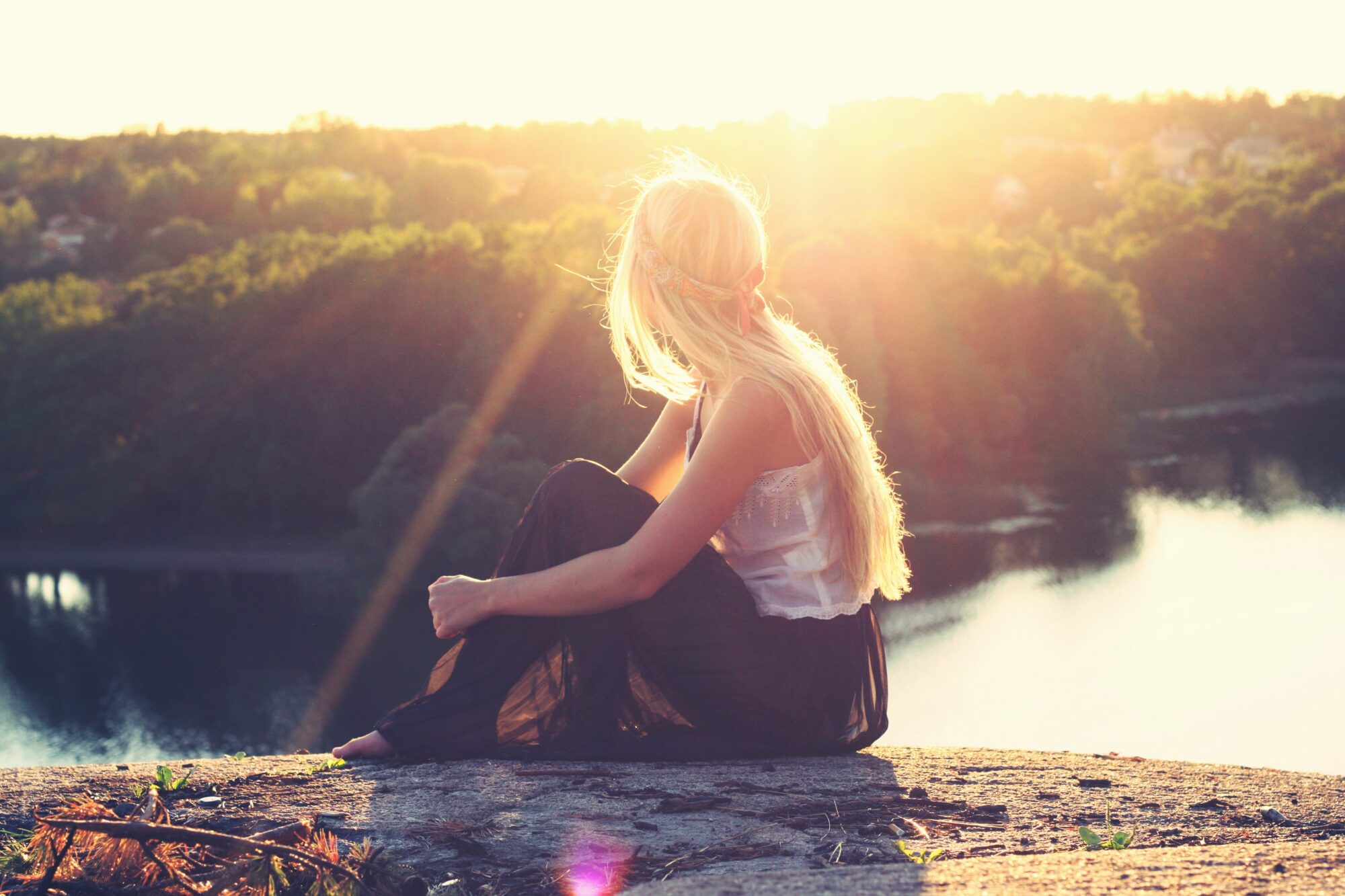 woman looking at sunset