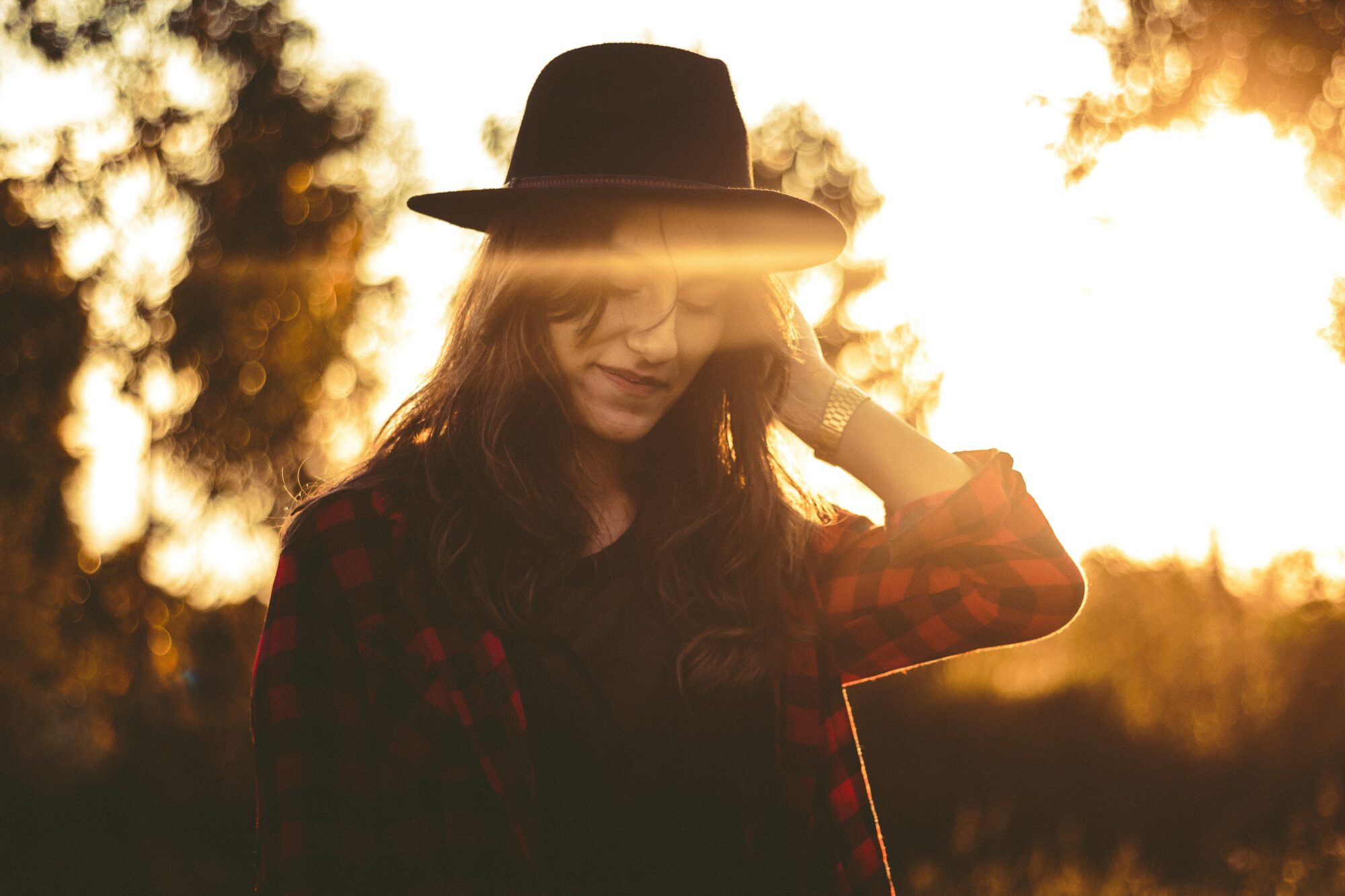 woman walking during sunset