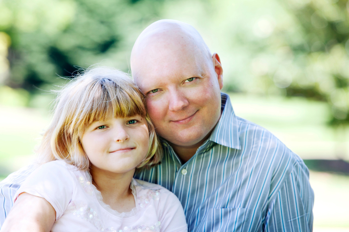 man with cancer and child