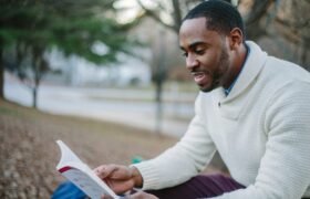 man reading a book